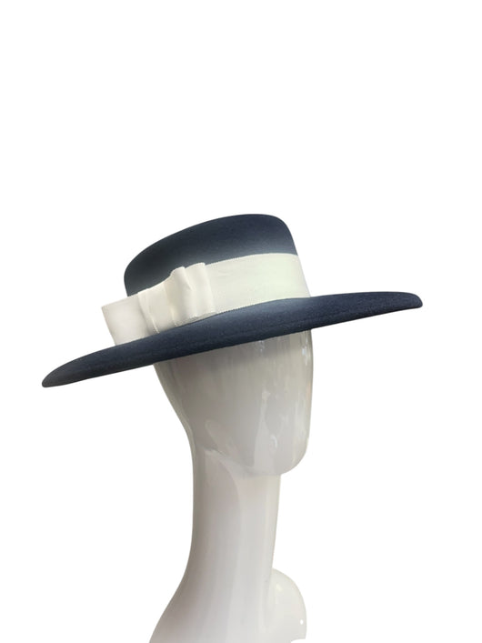 Navy Boater with white ribbon. 56cm