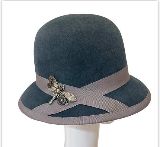 Spectacular dusty blue cloche with a ‘Dragonfly’ trimmed ribbon -M