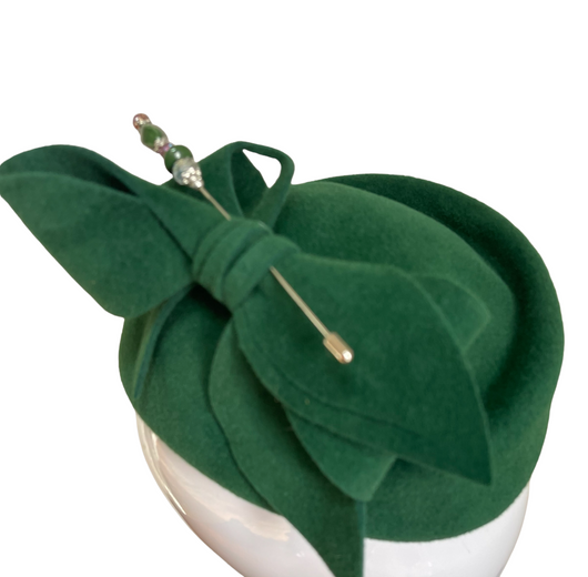 Kelly green cocktail hat.